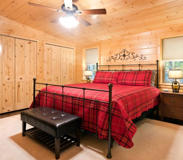cabin bedroom with two closets