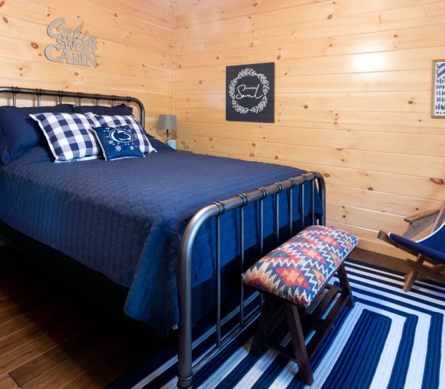 cabin bedroom with queen sized bed